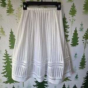 Elegant White H&M Laser Cut Lace Skirt